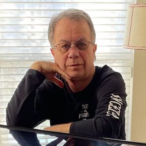 Portrait photo from the person who gave a review.